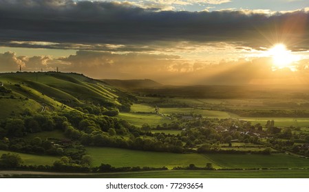 Landscape Over English Countryside Landscape In Summer Sunset