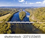 Landscape overlooking the forest and the Potomac River with a bridge on the border of the states of Maryland and Virginia. aerial photo