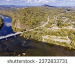 Landscape overlooking the forest and the Potomac River with a bridge on the border of the states of Maryland and Virginia. aerial photo