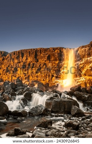 Landscape of Oxararfoss waterfall in Thingvellir National Park, Iceland. Oxararfoss waterfall is the famous waterfall attracting tourist to visit Thingvellir located in route of Iceland Golden Circle
