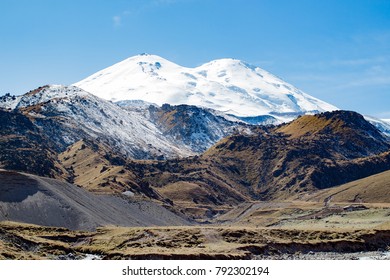 Landscape panorama Elbrus mountain with autumn hills daytime