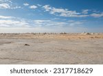 Landscape panoramic scenic view of desolate barren western white desert in Egypt with geological chalk rock formations