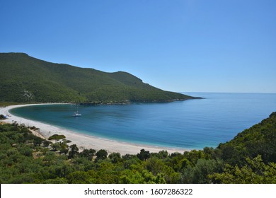 Landscape With Panoramic View Of A Catamaran On The Waters Of Fokiano Bay In Arcadia, Peloponnese Greece. 