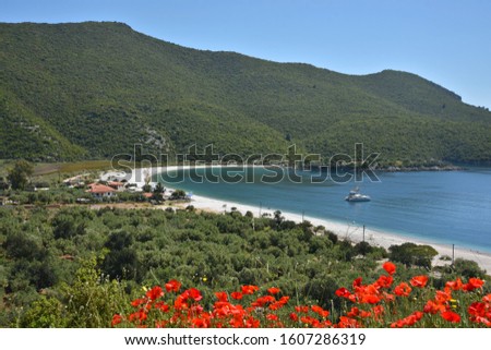 Landscape with panoramic view of a Catamaran on the waters of Fokiano Bay in Arcadia, Peloponnese Greece. 