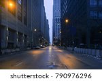 A landscape phot of downtown Chicago. The shot is taken from the middle of the street.
