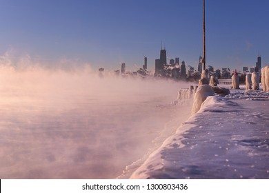 A landscape photo of the Chicago skyline during the polar vortex storming across Lake Michigan. 