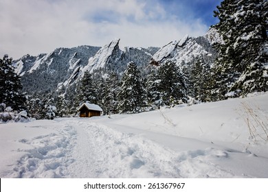 landscape photo of flat irons in boulder colorado with focus on the shack in the foreground