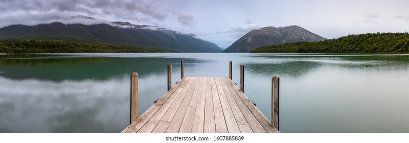 Landscape photo of a jetty on Lake Rotoiti, New Zealand. This jetty is within the  Nelson Lakes National Park and is one of the most Instagrammed locations in New Zealand