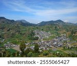 landscape photography of hill and mountain at Dieng plateau in Central Java, Indonesia