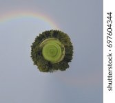 Landscape with rainbow, shown as tiny planet