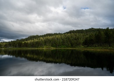 Landscape Reflection Still Water Lake In Norway During Summer