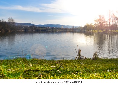 Landscape With Reflection In Water. Series. Beautiful Noon Over Calm Lake In Gorj  Targu Jiu County. After Sunset Sky Reflecting In Water, Calm Vibrant Landscape. Moi Lake Or Lacul Moi.