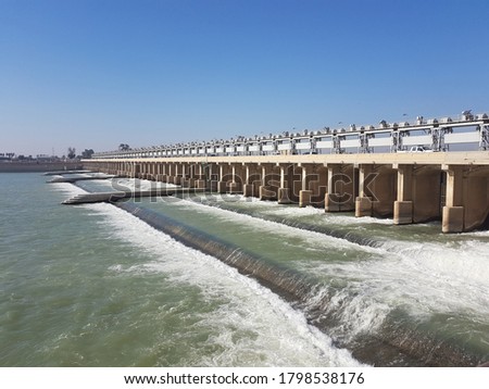 A landscape represents the Tigris river and Al Kut barrage, Iraq.