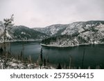 Landscape of the river among the stones, fast flow of water in the reservoir in the light of day, Siberian river Yenisei in Krasnoyarsk