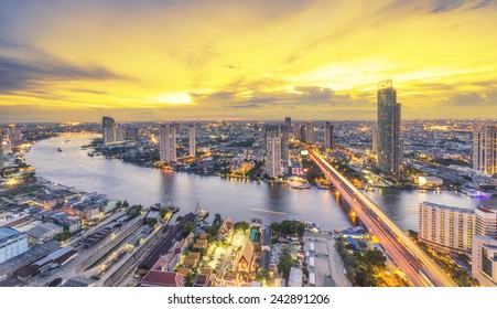 Landscape Of River In Bangkok City In Night Time With Bird View.