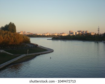Landscape with a river in the city of Astana. View from the bridge.