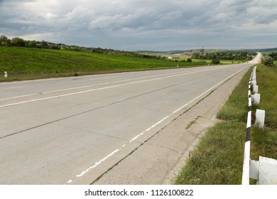 Landscape with a road and clouds. Beautiful views along the highway Chisinau Cimislia. The Republic of Moldova.