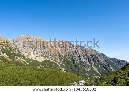 Landscape of rocky mountain range Granaty and Krzyzne pass in Five Polish Ponds Valley in Tatra Mountains, Poland. Imagine de stoc © 