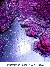 Landscape scene hidden in a microscopic salt crystal precipitated on the glass wall