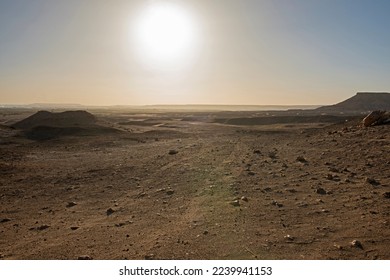 Landscape scenic view of desolate barren rocky western desert in Egypt with mountains at sunrise - Powered by Shutterstock