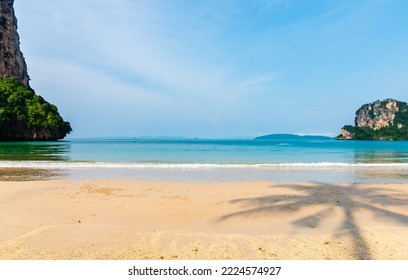 Landscape Of Sea Beach Sand And Blue Sky With Sunny In Nice Weather Day At Railay Krabi Sea Thailand.