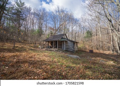 Landscape of Shenandoah National Park Corbin Cabin in autumn with fallen leaves and blue sky with clouds