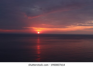 Landscape shot of the beautiful evening sunset skies at the Andaman ocean. 