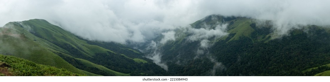 Landscape shot of beautiful green mountains. Landscape shot of beautiful green western ghats of Karnataka. - Shutterstock ID 2215084943