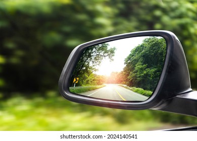 Landscape In The Sideview Mirror Of A Car , On Road Countryside.