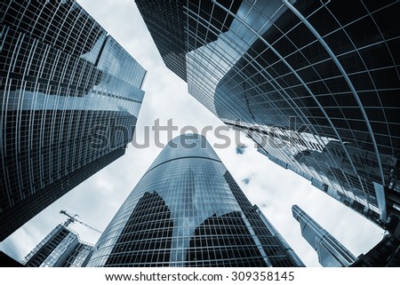 landscape of silhouettes of skyscrapers in the city. toning image. Focus on the tops of skyscrapers