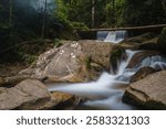 A landscape of silky waterfalls at Tekala River Waterfall, Semenyih.