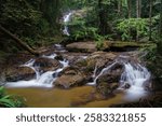 A landscape of silky waterfalls at Tekala River Waterfall, Semenyih.