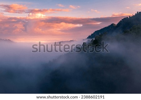 landscape and sky background concept, nature of north Thailand, fog-laden valleys, wintery mountain passes of Mae hong son province,  top view on the mountain sunrise and sunset