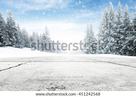 landscape of sky and trees of snow and road and free space for your decoration 