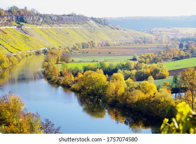 Landscape In Southern Germany In Great Autumn Colors With River And Vineyard,