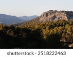 Landscape with the summit where the archaeological site of the Iberian settlement El Puig de Alcoy is located from La Sarga, Spain