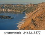 Landscape at sunrise of the shoreline of Crater Lake, Crater Lake National Park Oregon, USA