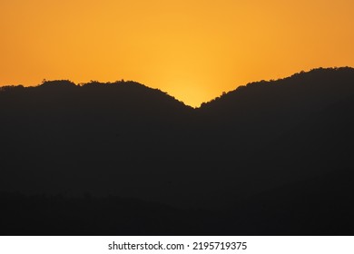 Landscape of the sunset mountains of Lore Lindu national park, near Bomba, South Lore, Poso Regency, Central Celebes, Indonesia - Shutterstock ID 2195719375