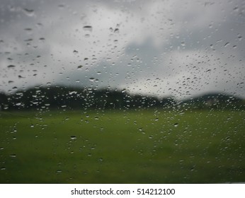landscape through rainy window
