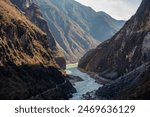 The landscape of Tiger Leaping Gorge in Yunnan province of China. Scenic spot where a tiger is said to have leaped across the river, thus giving the gorge its name.