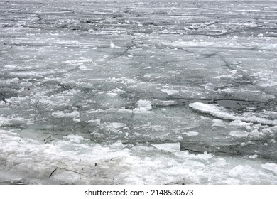 Landscape With Treacherous Melting Broken Ice Floes Floating Dense On The River On A Spring Day