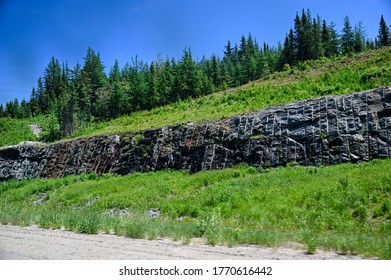 Landscape Of Trees And Mountains  From Car In Northern Quebec