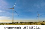 Landscape with Turbine Green Energy Electricity, Windmill for electric power production, Wind turbines generating electricity on field at Phan Rang, Ninh Thuan, Vietnam. Clean energy concept.