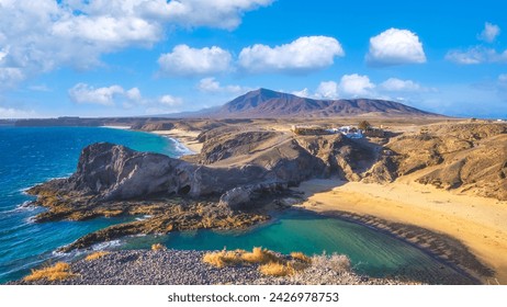 Landscape with turquoise ocean water on Papagayo beach, Lanzarote, Canary Islands, Spain