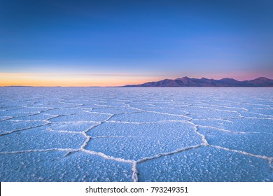 Landscape of the Uyuni Salt Flats at sunrise, Bolivia - Powered by Shutterstock