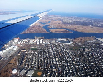 Landscape View From Airplane, Photo Taken Near Newark, New Jersey. Oil Refinery Storage And Elizabeth Seaport Can Be Seen On The Ground.