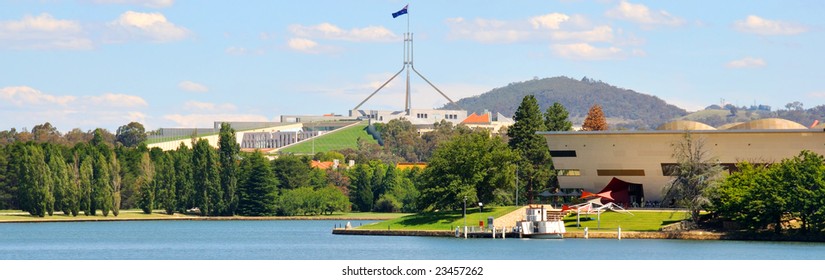 Landscape View Of The Australian Parliament In Canberra Opposite Lake Burley Griffin