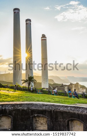 Landscape View Of The Beautiful Ocean Coast With Power Plant Chimneys On The Side At Sunset From The Historic Baimiweng Fort (Holland Castle) , Keelung, Taiwan