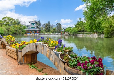 Landscape View Of The Black Dragon Pool, It Is A Famous Pond In The Scenic Jade Spring Park Located At The Foot Of Elephant Hill,Lijiang China