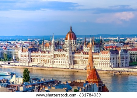 A landscape view of Budapest city in the evening, the Hungarian parliament building and otherr buildings along Danube river, Hungary.